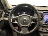 the interior of a car with a steering wheel, dashboard, and display screen