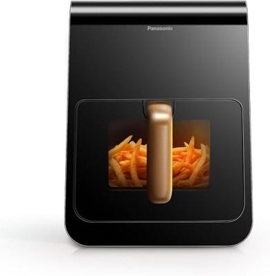 une photo d'un robot ménager contenant des carottes