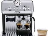 an image of a coffee machine with two cups of coffee