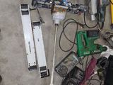 a lot of tools that are sitting on the floor