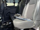 a seat in the back of a van that has been vandalized