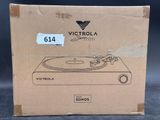 a box with a picture of a record player inside of it