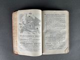 an open book with a map of a city on it