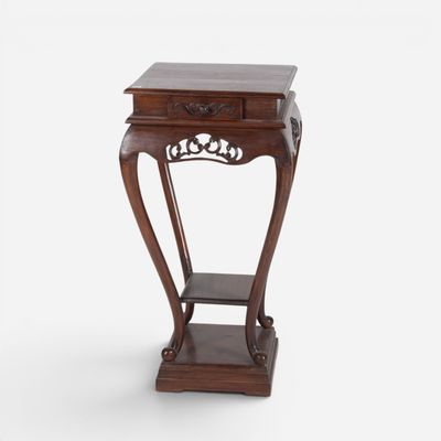 an old wooden table with a drawer on top of it
