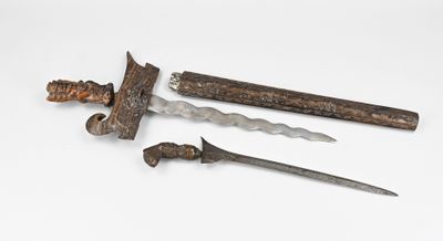 three different types of weapons are displayed on a white surface