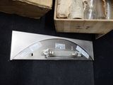 a box that has some bottles and a knife in it