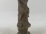 an antique bronze statue of a woman holding a bird on a pedestal