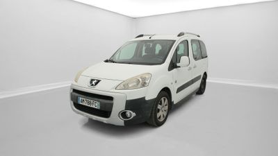 the small white van is parked in a white room