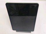 an image of a black tablet computer sitting on top of a white table