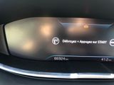 the dashboard of a car with a digital display on it ' s dashboard