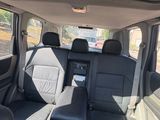 the interior of a car with black leather seats and black leather trims