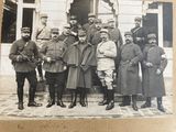 an old photo of a group of men in military uniforms
