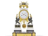 une image représentant une horloge posée sur une table