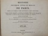 an old book with a black and white title on it