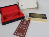 a small box that has a card inside of it