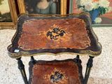 a small table with a tray on top of it
