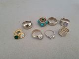a lot of rings that are sitting on a table
