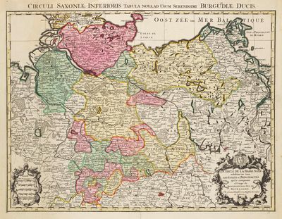 une vieille carte de la Belgique avec ses frontières en rose, vert et jaune