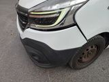 a picture of a white van that has been badly damaged