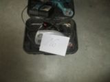 a small piece of luggage with a note attached to it