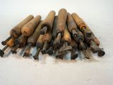a lot of wooden sticks that are on the table
