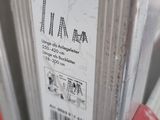 a close up of a parking meter with a sticker on it