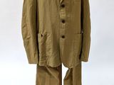 an image of a suit on a mannequin stand