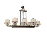 a chandelier with five lamps and a bird on it