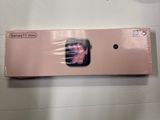 a pink box with a picture of a woman on it
