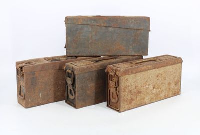 three old suitcases sitting on top of each other on a white surface