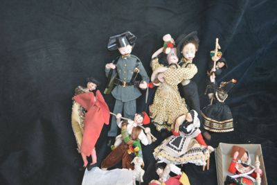 a lot of figurines that are on a table