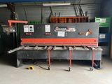 an image of a machine that is in a garage