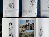 several pages of comics are spread out on a table