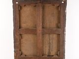 an old wooden box with four compartments on a white surface