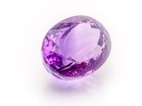 a purple amethorate gems on a white background