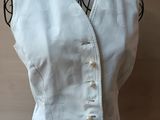an image of a white top on a mannequin mannequin