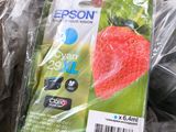 an image of a package of epson ink cartridges in a cardboard box