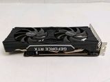 a close up of a video card on a white surface