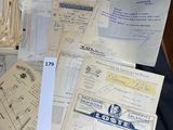 a pile of papers and papers sitting on a chair
