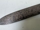 a knife that is sitting on a table