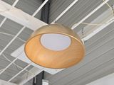 a light that is hanging from the ceiling of a building