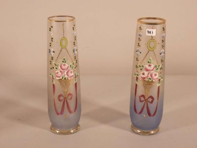 two vases that have been decorated with flowers on them