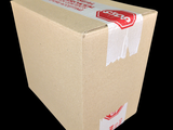 a cardboard box with a red and white label on it