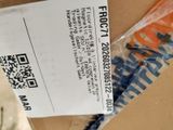 a box with a receipt on it sitting on a table