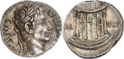 a silver coin with an image of a woman on it