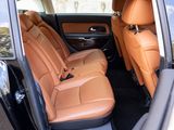 the interior of a car with tan leather seats and black trims