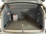 a trunk of a car with luggage in it