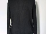 the back of a black sweater on a mannequin mannequin mannequin mannequin mannequin mannequin mannequin mannequin