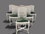 set of six white cane back chairs with green cushions