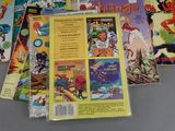 a lot of comic books that are on the table